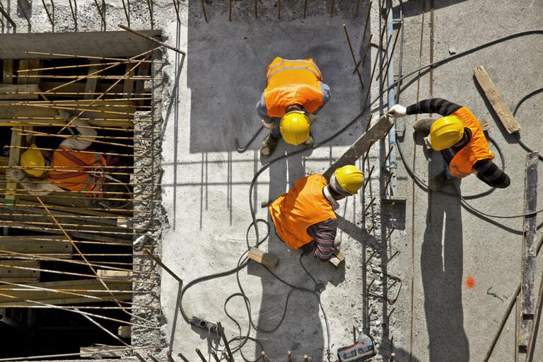 Construction site workers - aerial - Top View