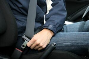 fastening a seatbelt