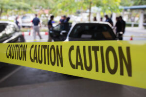 caution tape blocking off a car accident caution tape blocking off a car accident